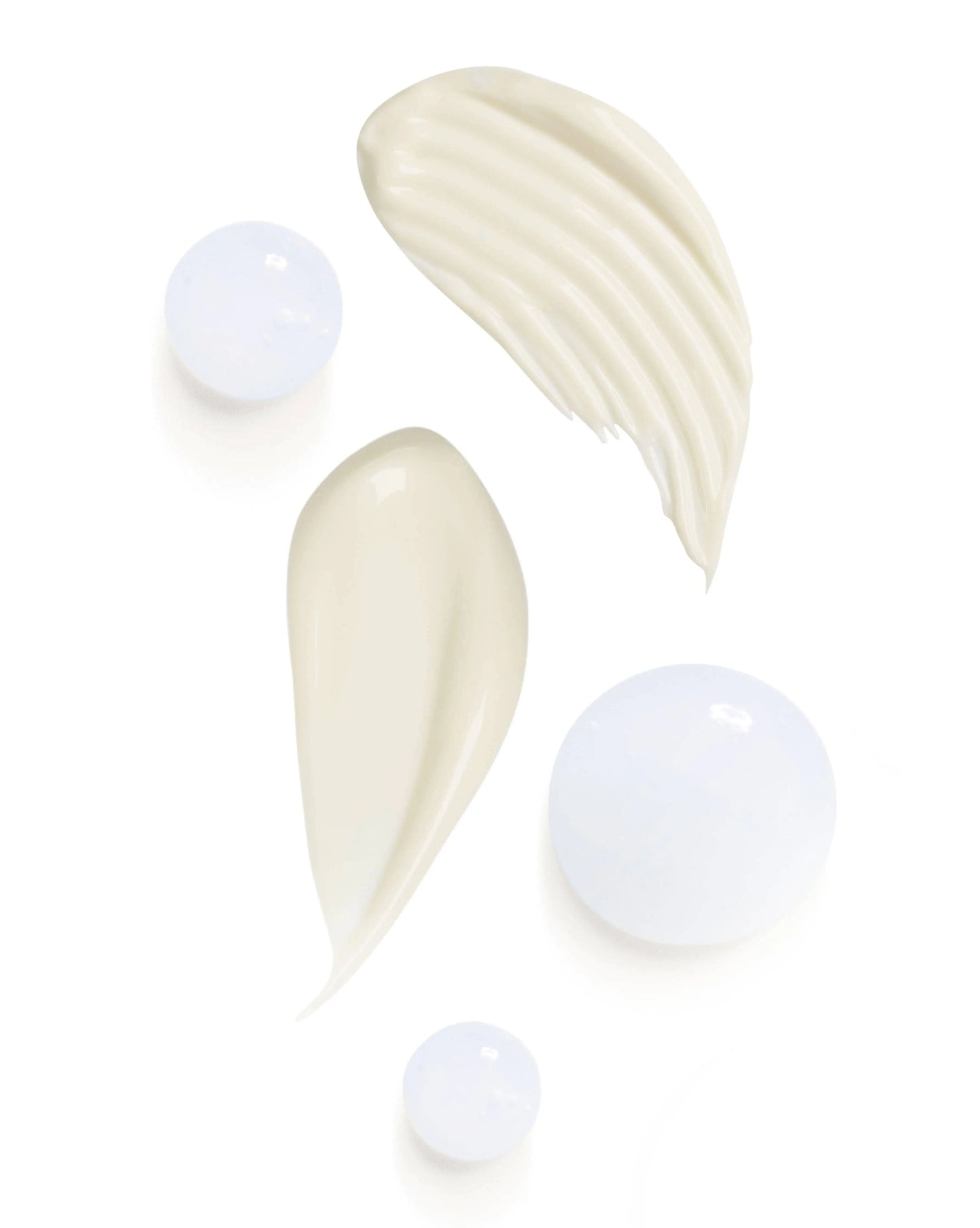 White cream swatches on a white background