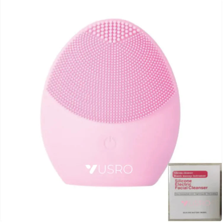 Pink silicone facial cleanser with USRO branding on a white background