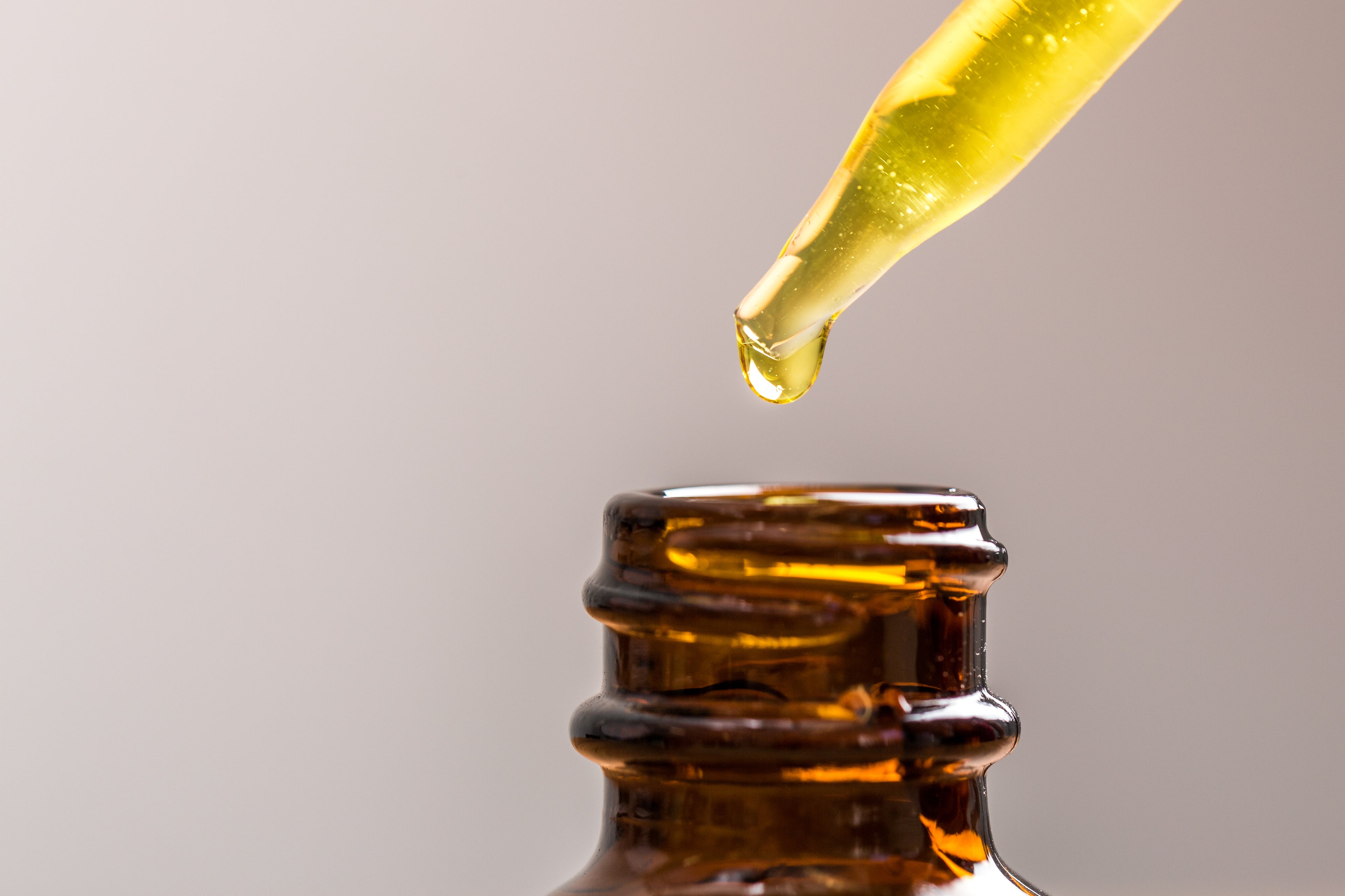 oil-dripping-into-jar