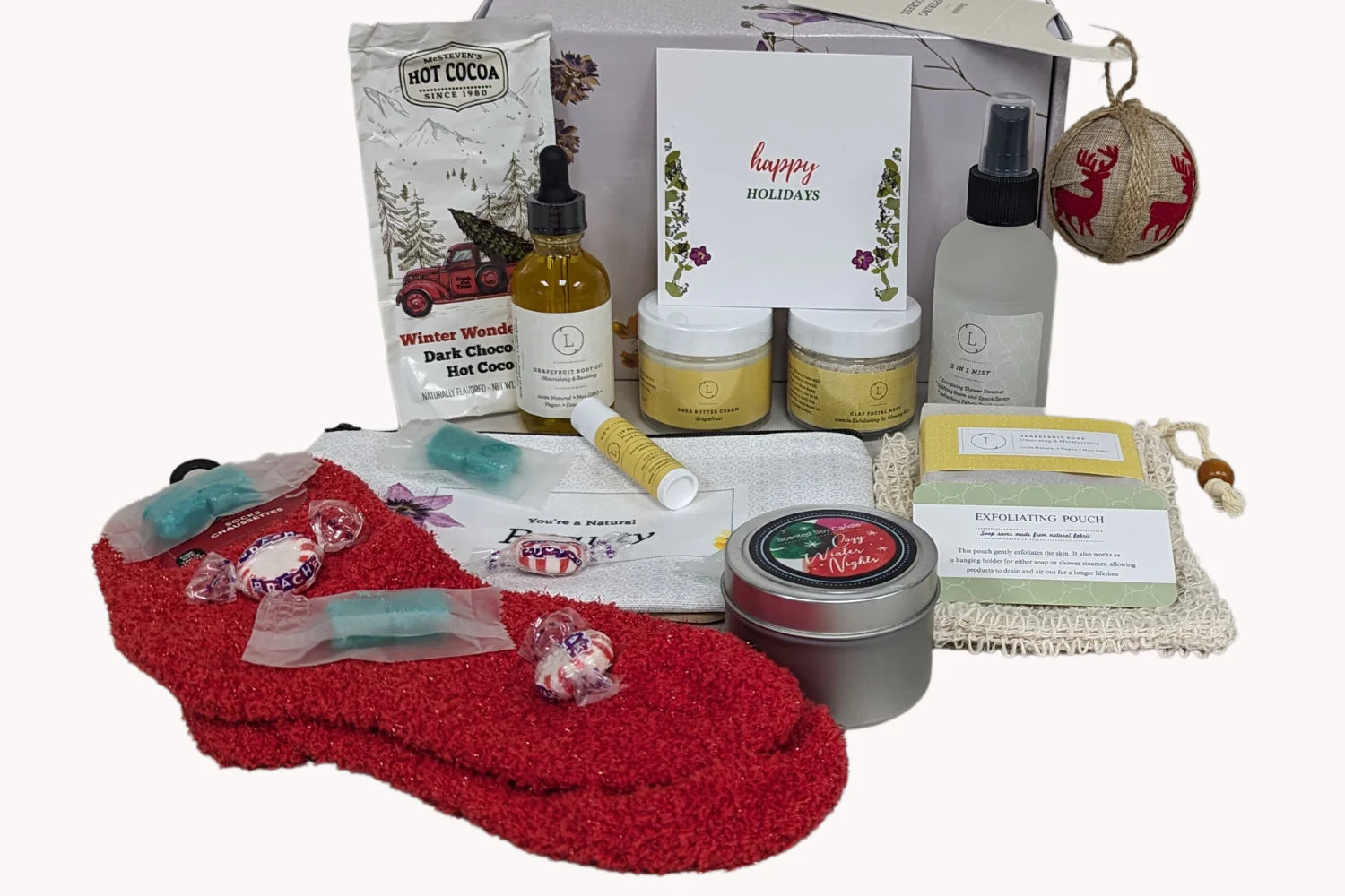 Collection of holiday-themed products including socks, candles, and gift bags on a white background
